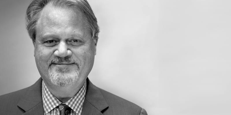 headshot in black and white for Louis Quinn