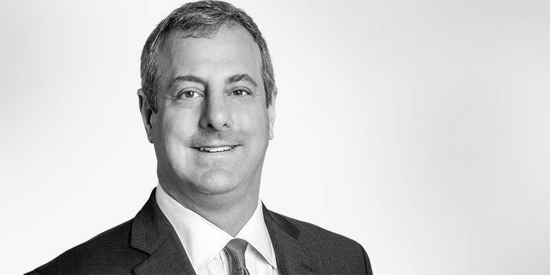 Black and white headshot of Steve Herman